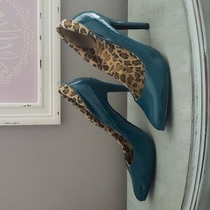 Unique teal patent heels size 6 with leopard lining.